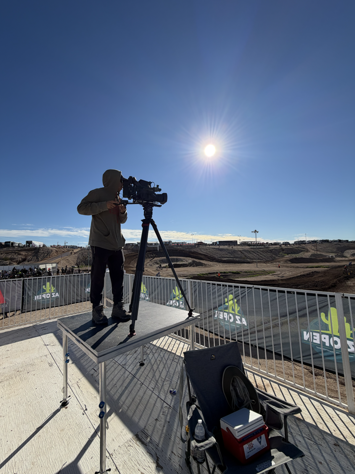 Camera operator at a motocross course