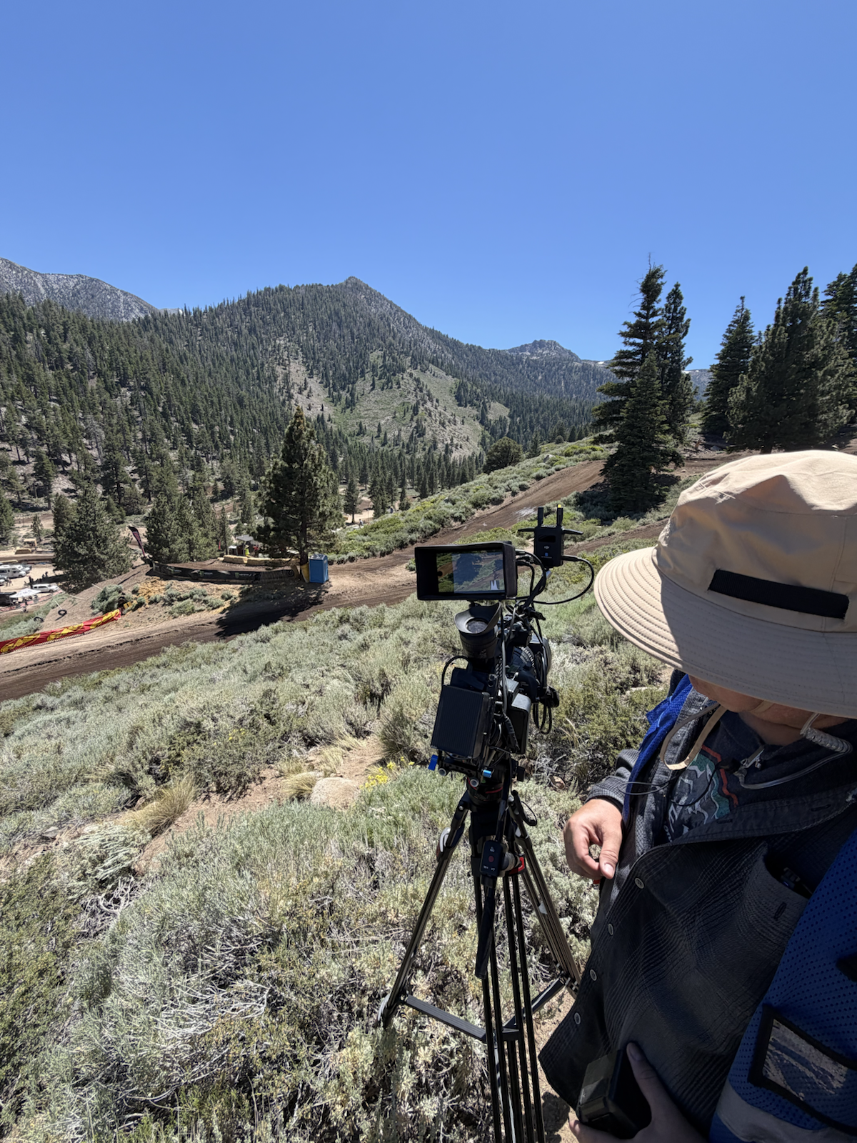 USA Sport camera operator covering a mountain race course